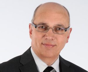 Dr. Walter Schoger, comFormer
